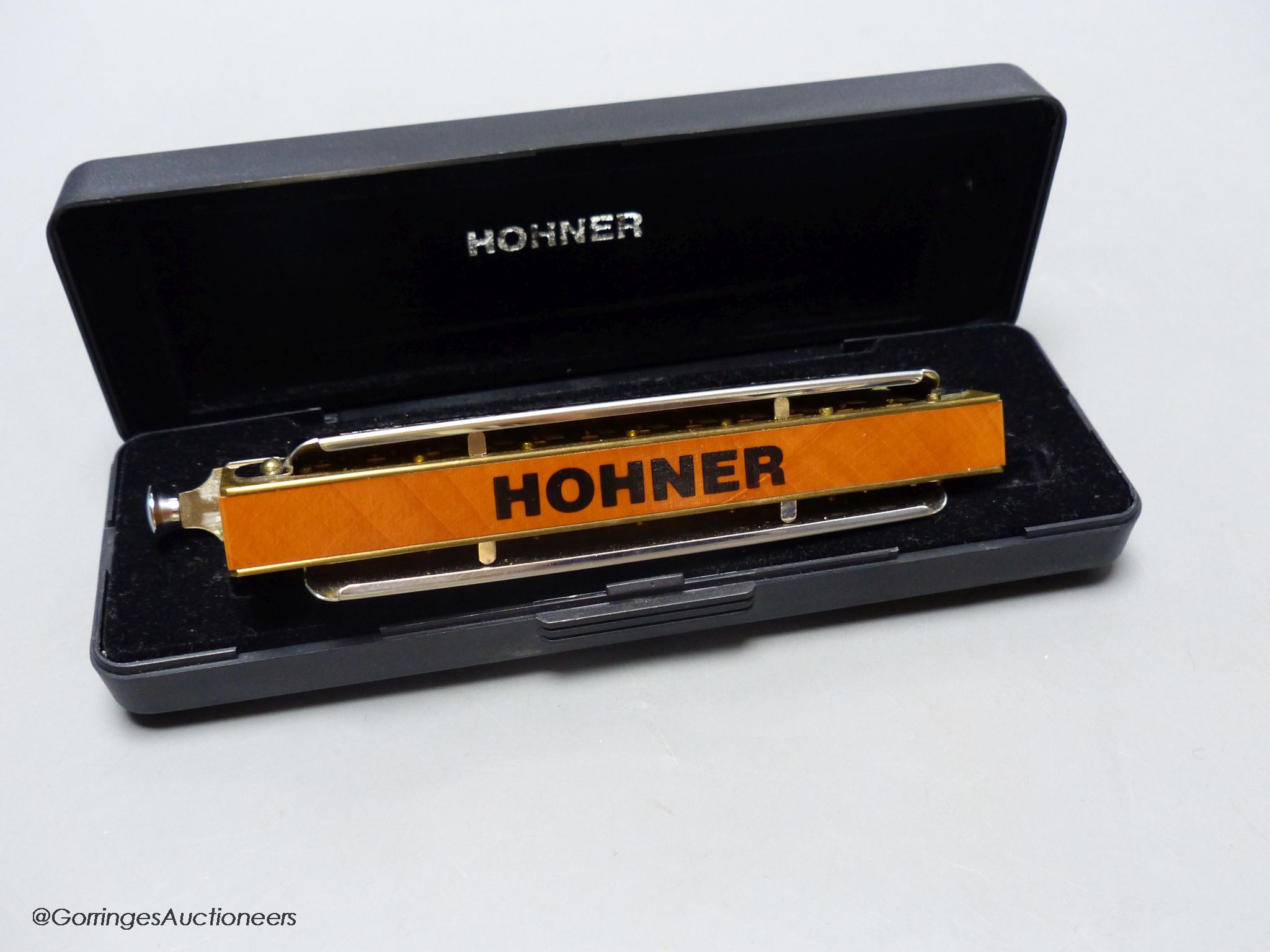 An M.Hohner Super Chromatica 270 deluxe Harmonica, cased